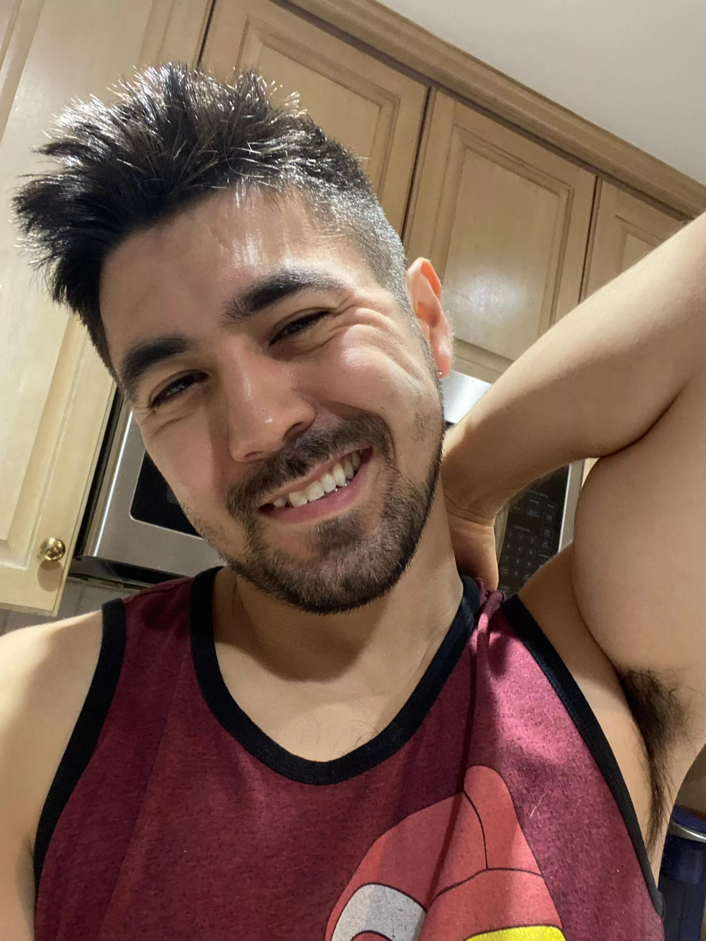 Shy dude in a kitchen