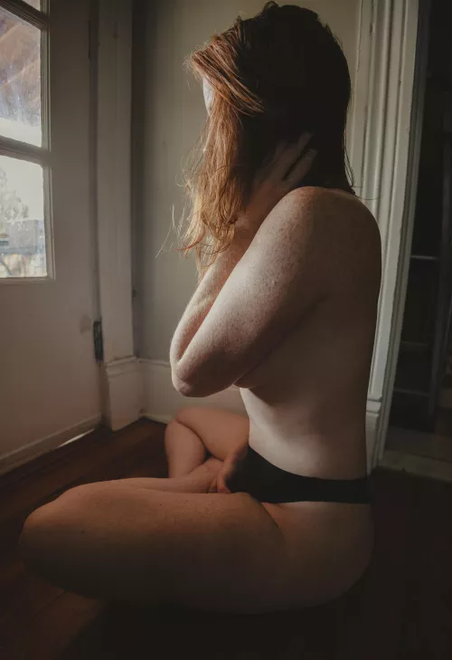 There is something magical about natural light through red hair.