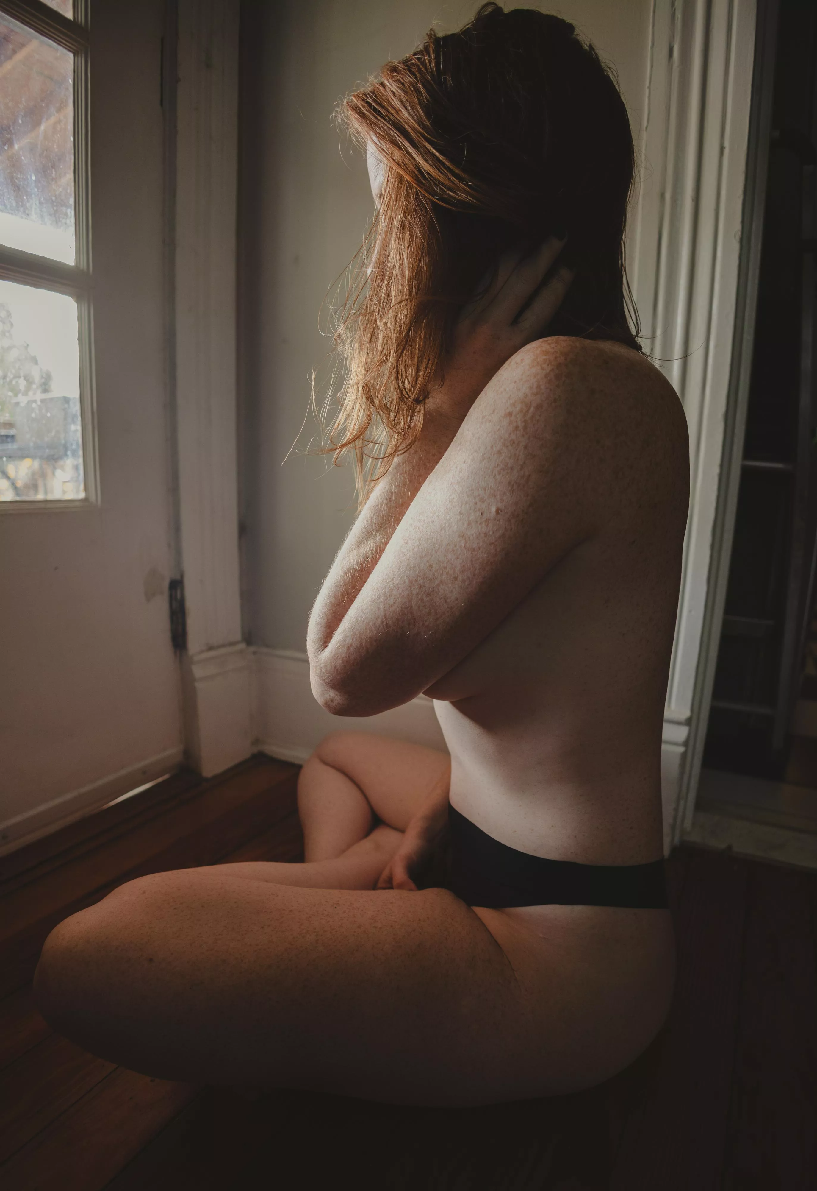 There is something magical about natural light through red hair.