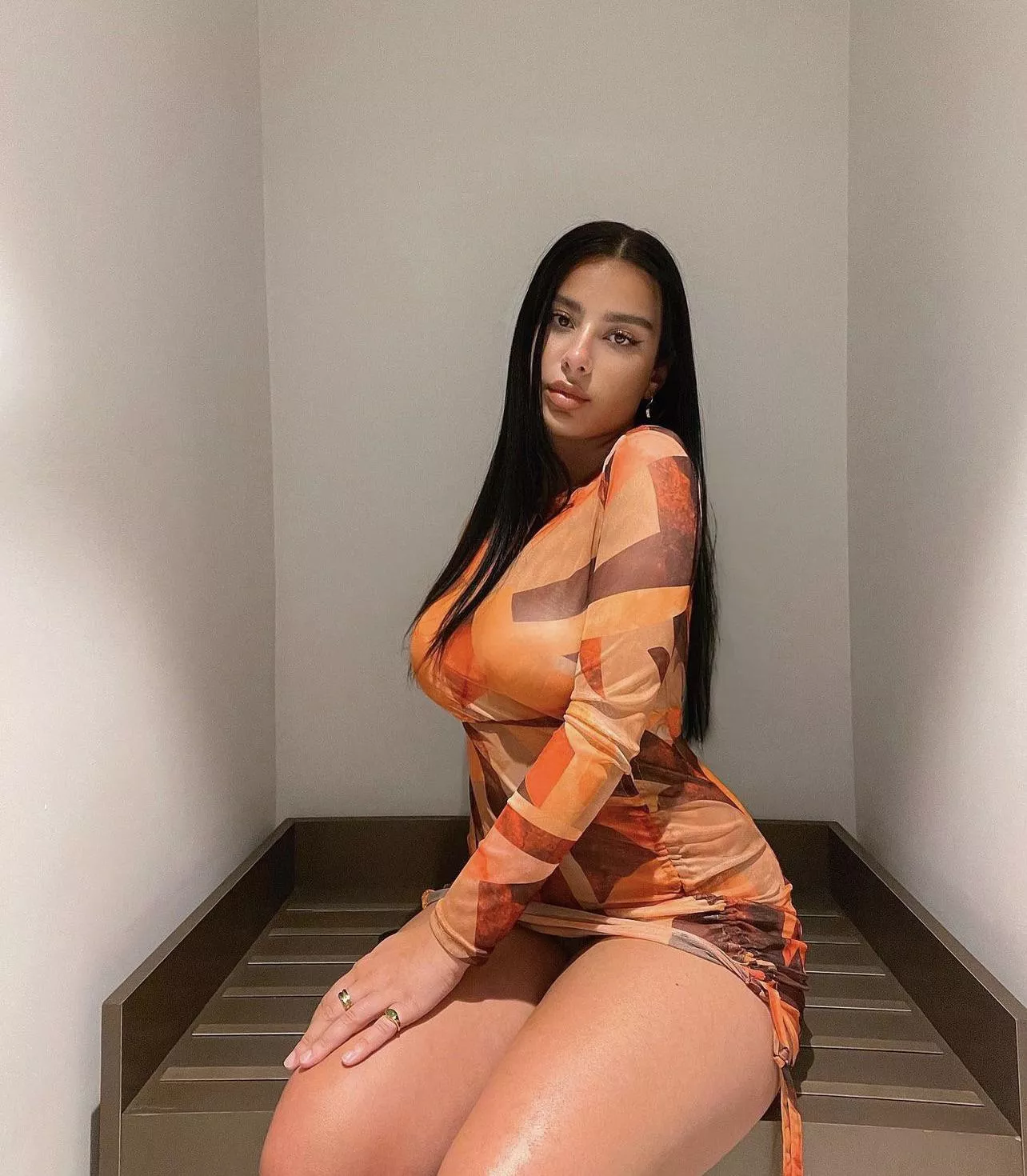 Tight dress, tanned skin