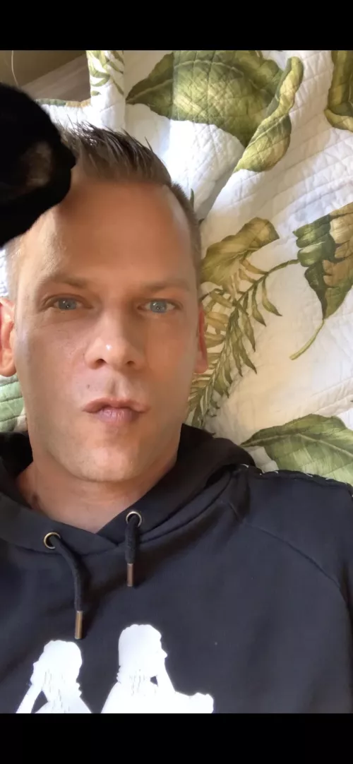 Will this cat ever stop licking my forehead!? Meow 🐈‍⬛