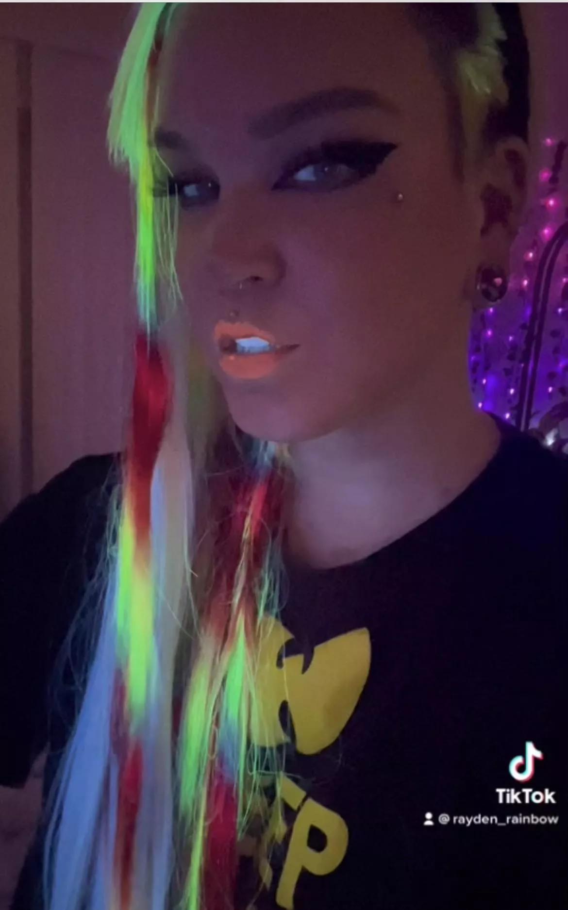My neon rainbow hair glows in black light!