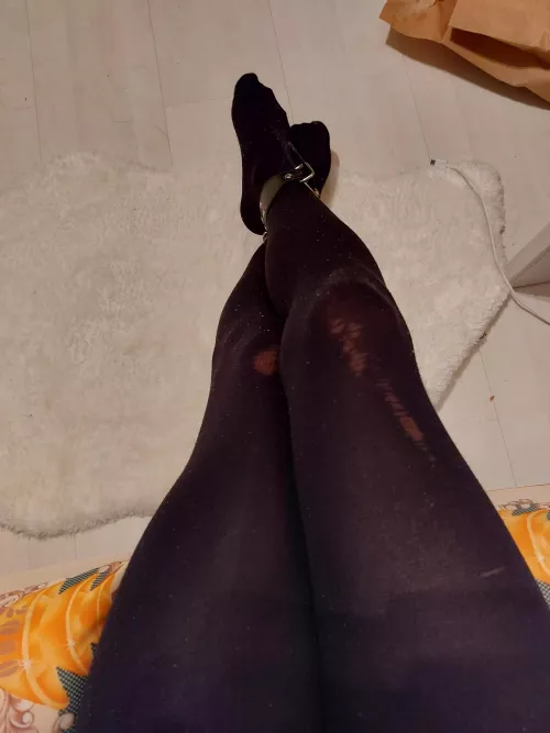 Worn out black nylons and cuffs!