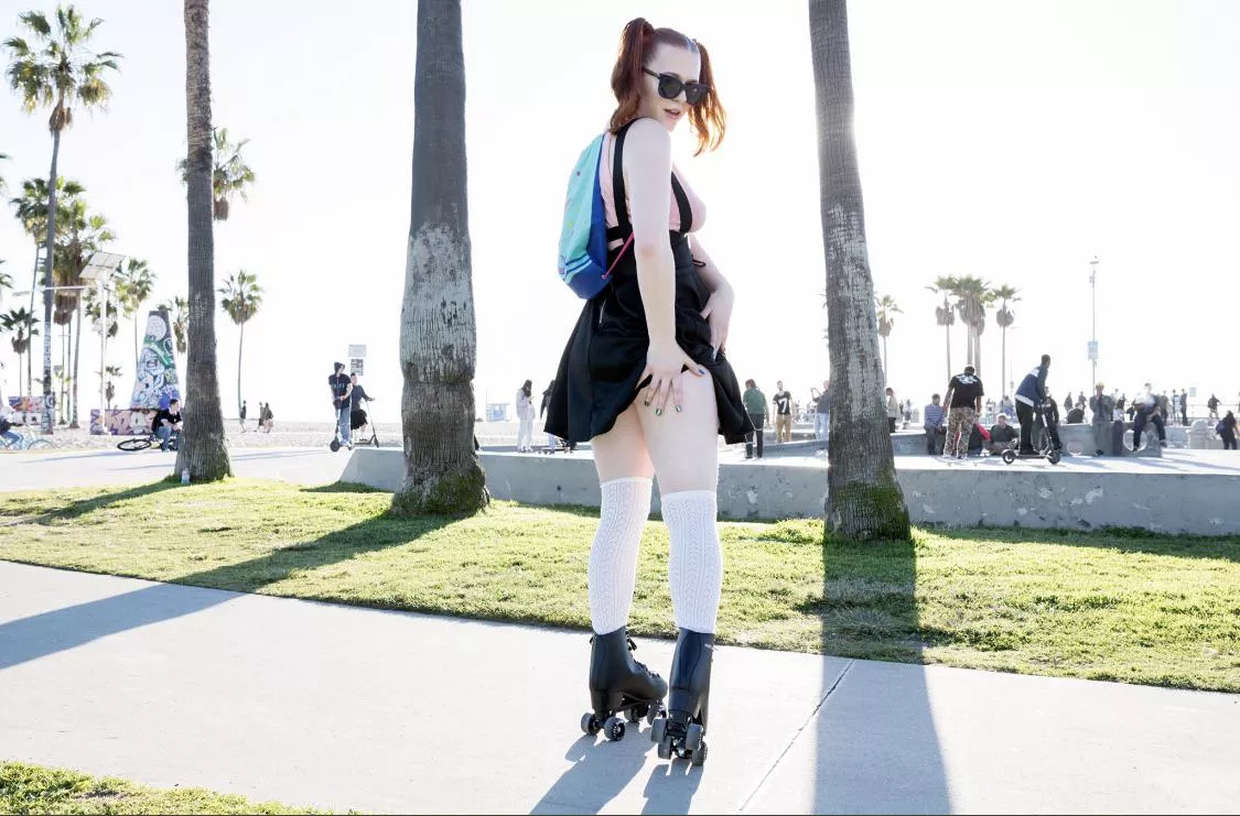 About to lift up my skirt on the boardwalk