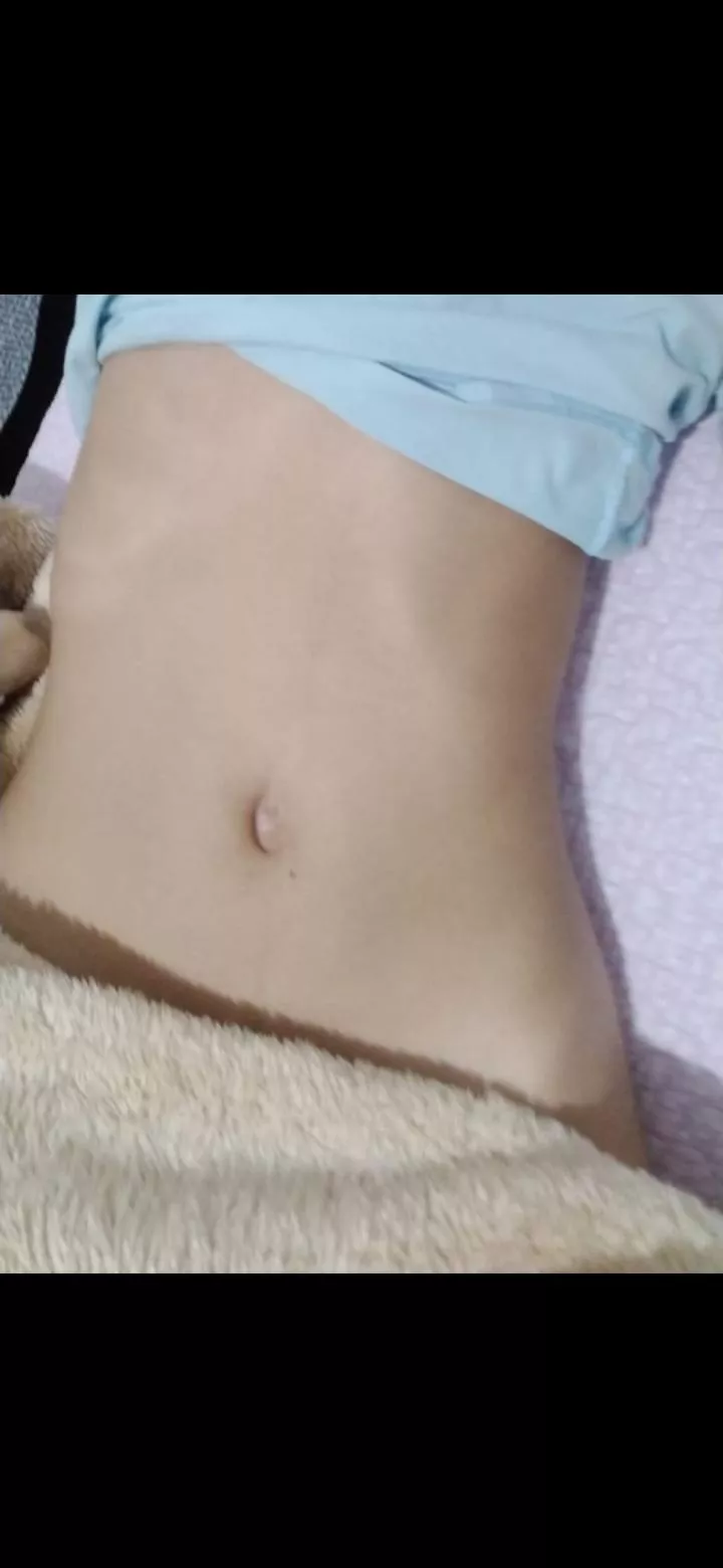 My girl is shy. But she has such a cute belly!