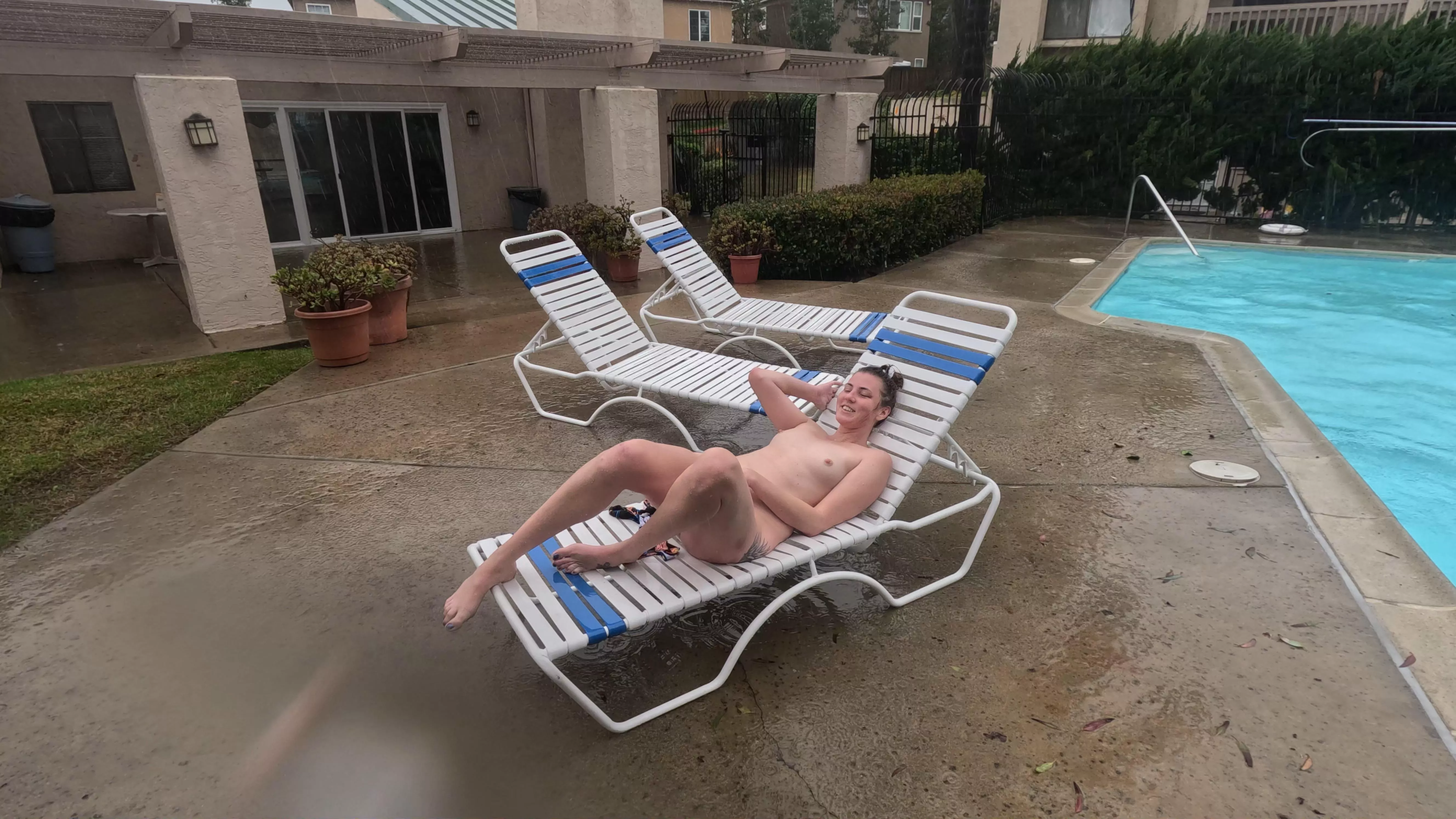 The rain on my skin feels almost as good as playing with my pussy by the pool [F]