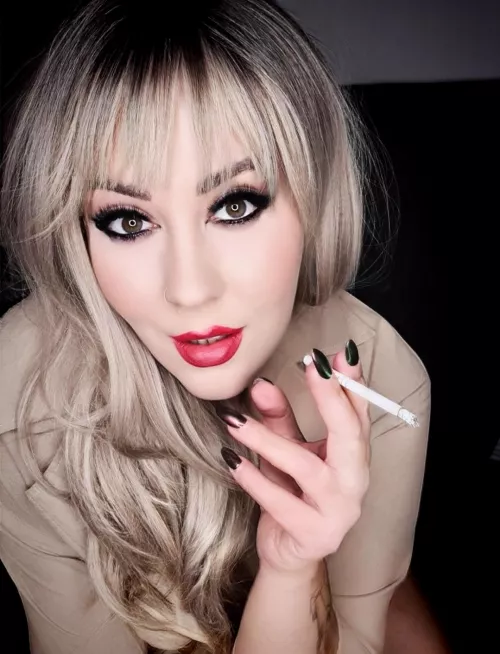 Watch me smoke as my eyes strip away the pretence that you are not addicted to me.