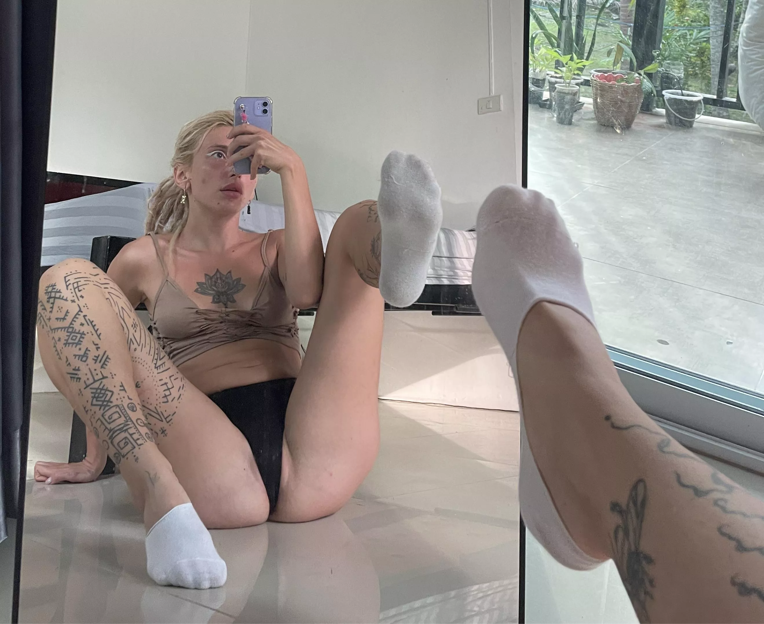 wearing only white socks 🫶🏽🤍