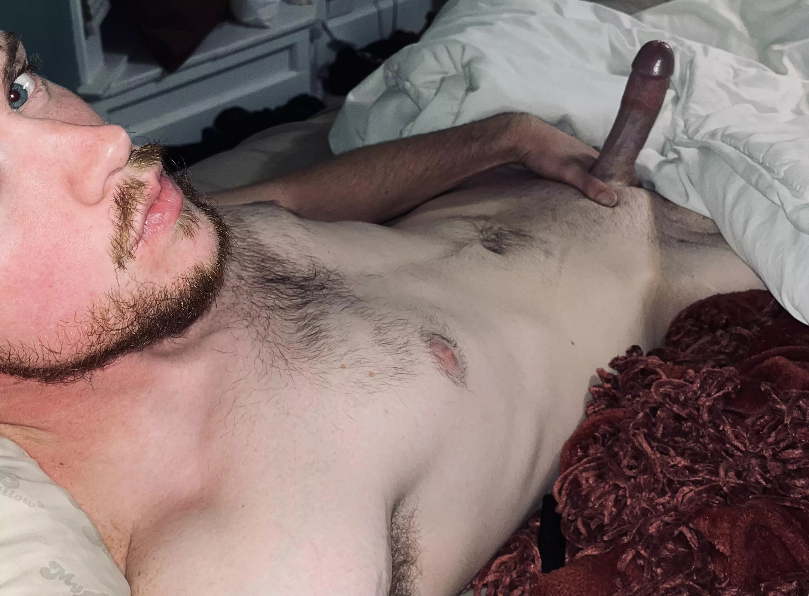 Just laying in bed, enjoying myself😈