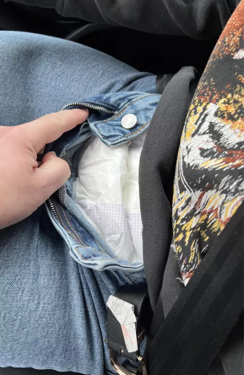 Nappy check in the car, good girl has used her nappy as she should