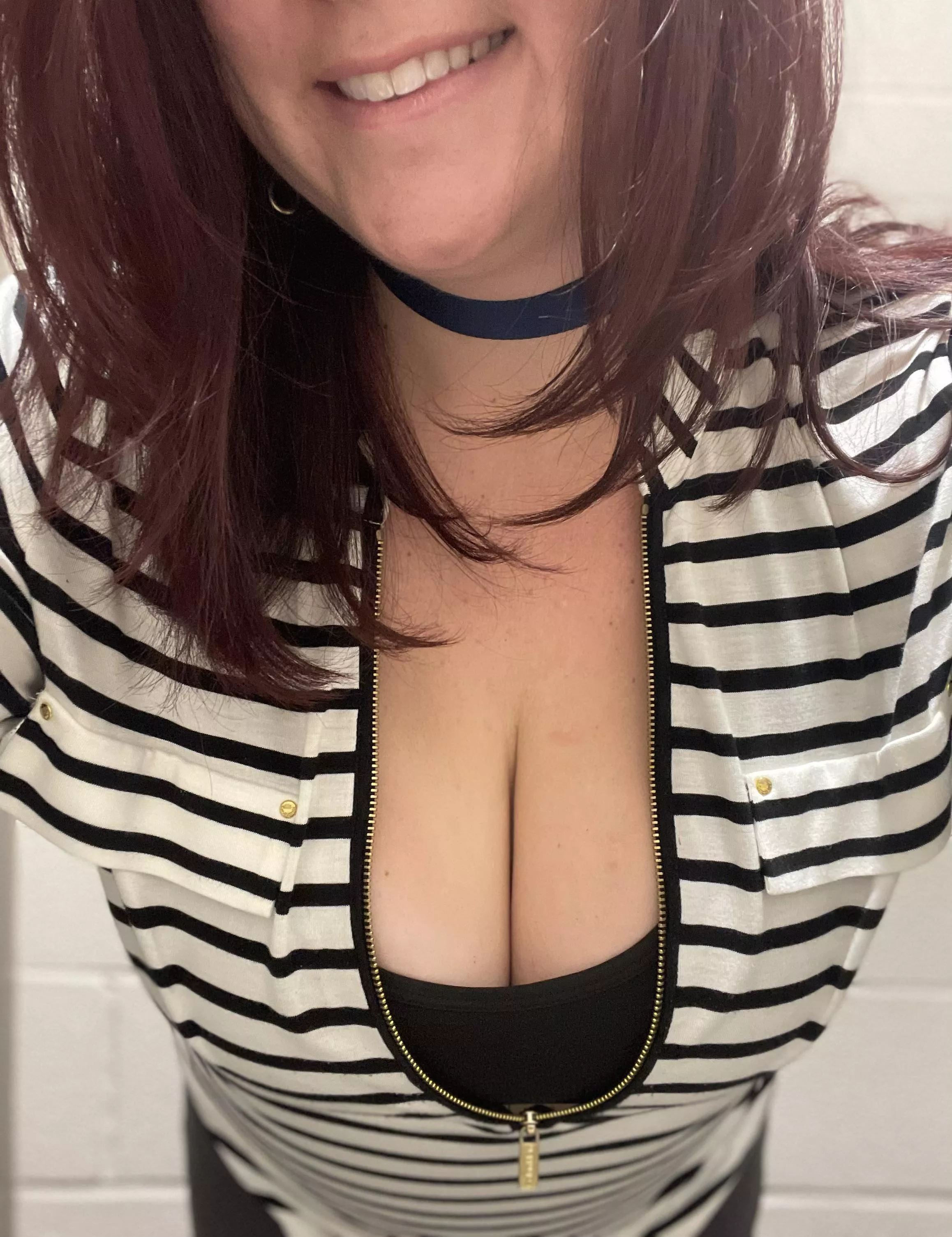 Trying to sneak a peek down teacher’s top?