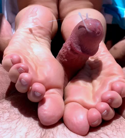 Footjob cumshot