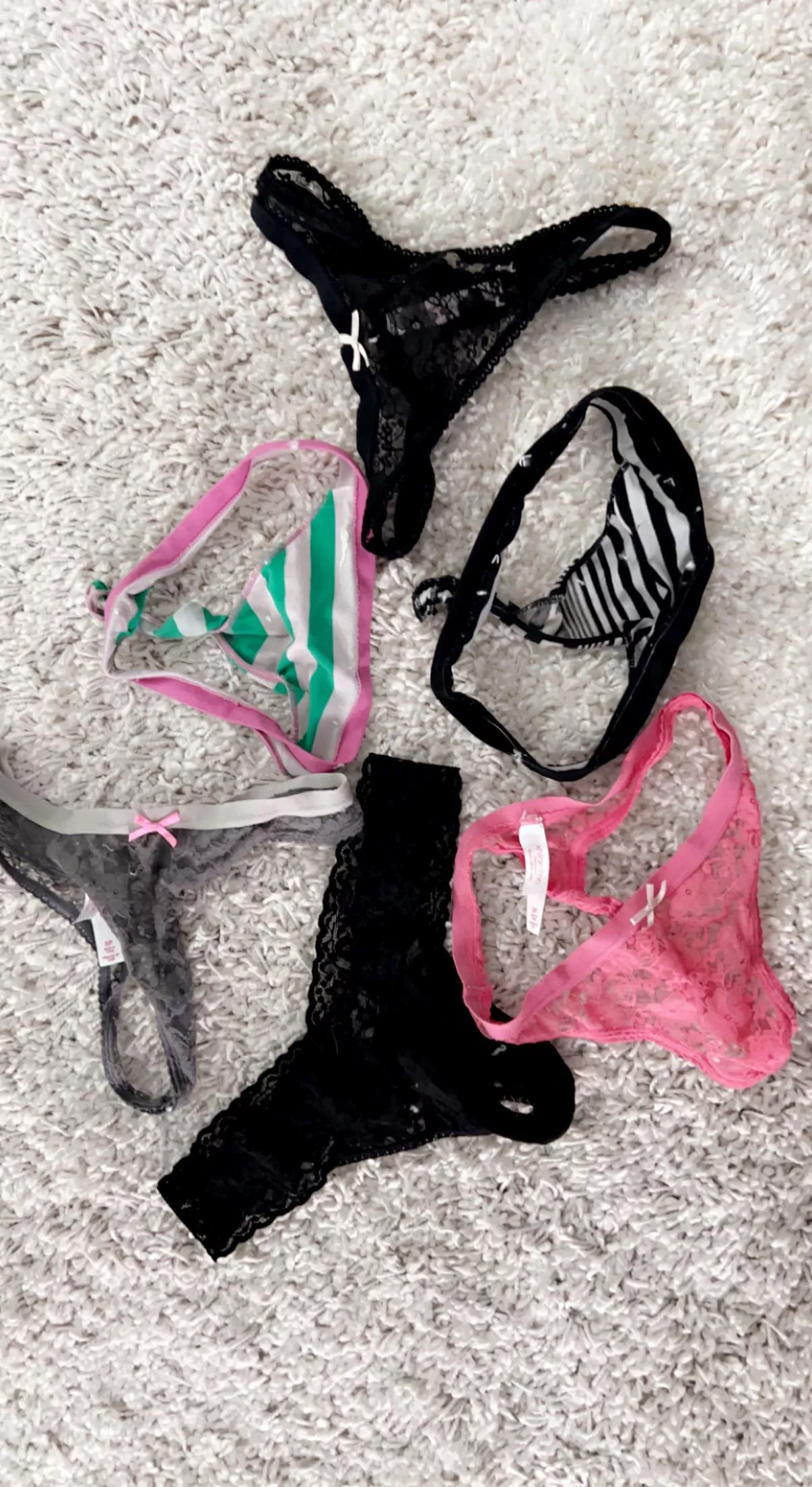 Trying to decide which of her thongs to slip into