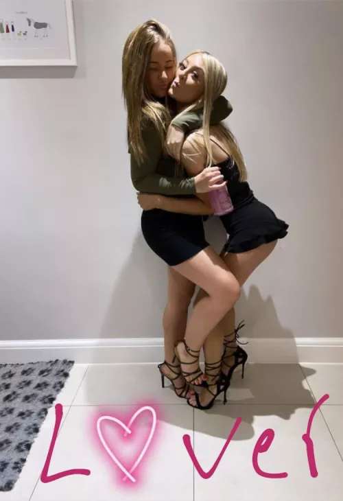 Girl on the right stealing the show. That skirt and heels though