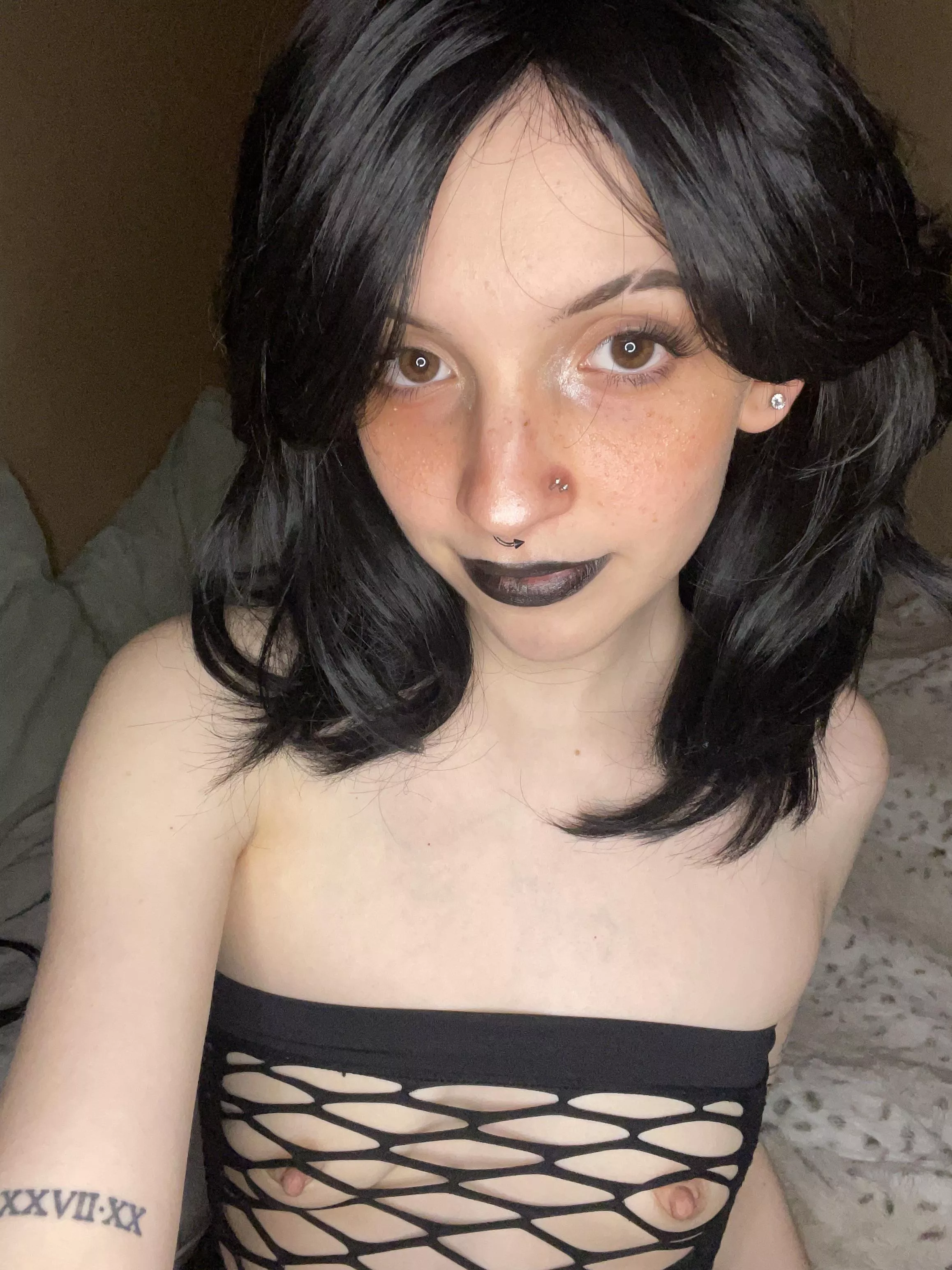 Gothic fishnet dress, lipstick, now I just need my chokers >.<