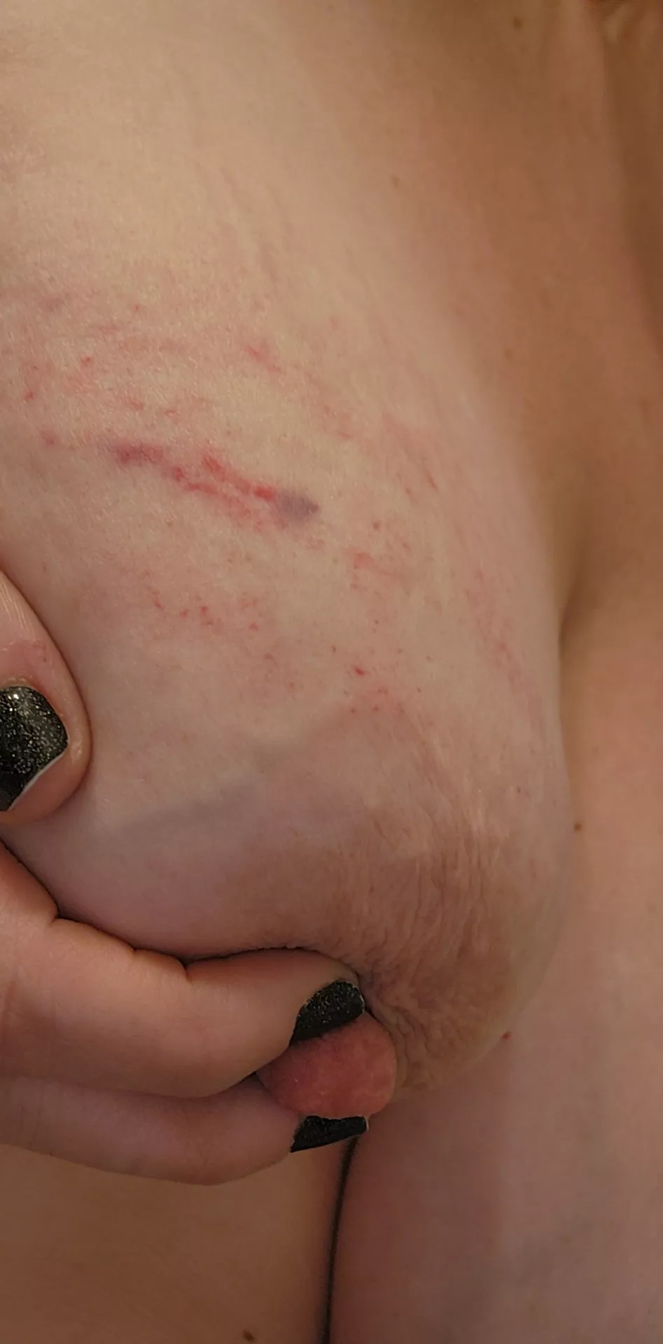 I enjoy these fun marks from Daddy...sucking his cock in a parking lot with my tits out. I think a second cock would have been even more fun. Any takers?