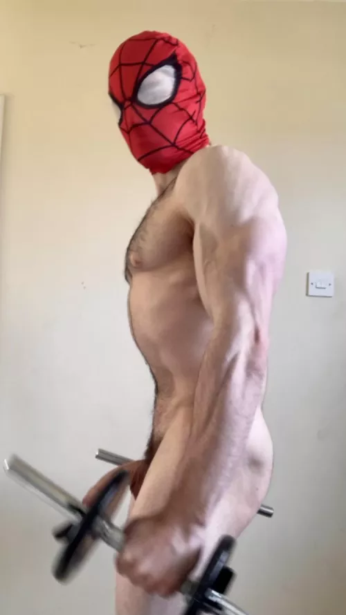 Triceps flexed, chest pumped, but Spidey has one more meaty muscle still show