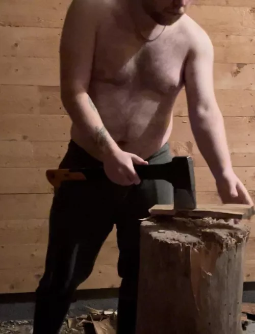 [23] Chopping some firewood with my hairy nips and belly showing 🤭