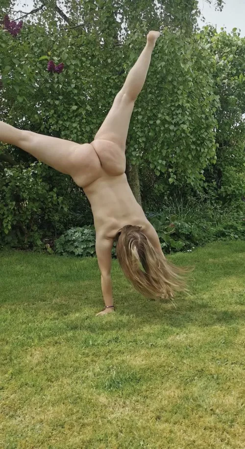 Love watching her doing naked cartwheels outside