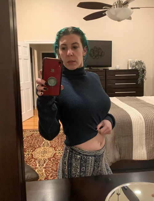 Busty in a turtleneck