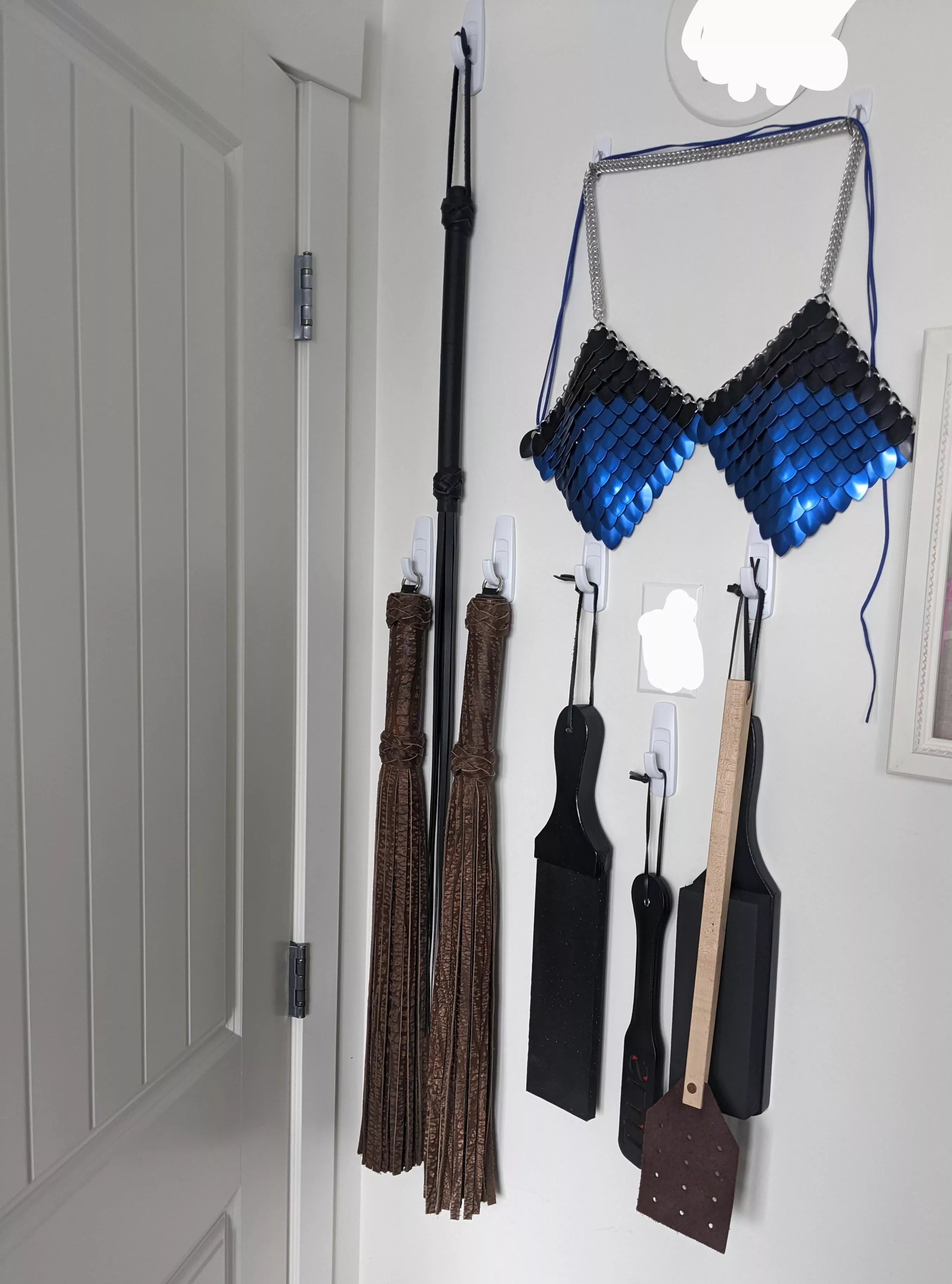 Impact play tools all stealthily tucked behind my bedroom door.