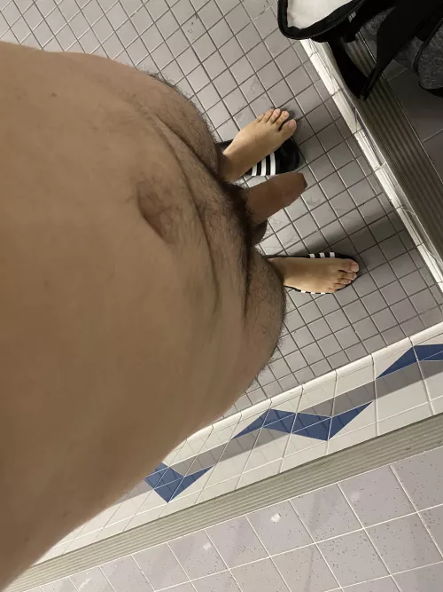 Latin dad about to hit the communal showers…