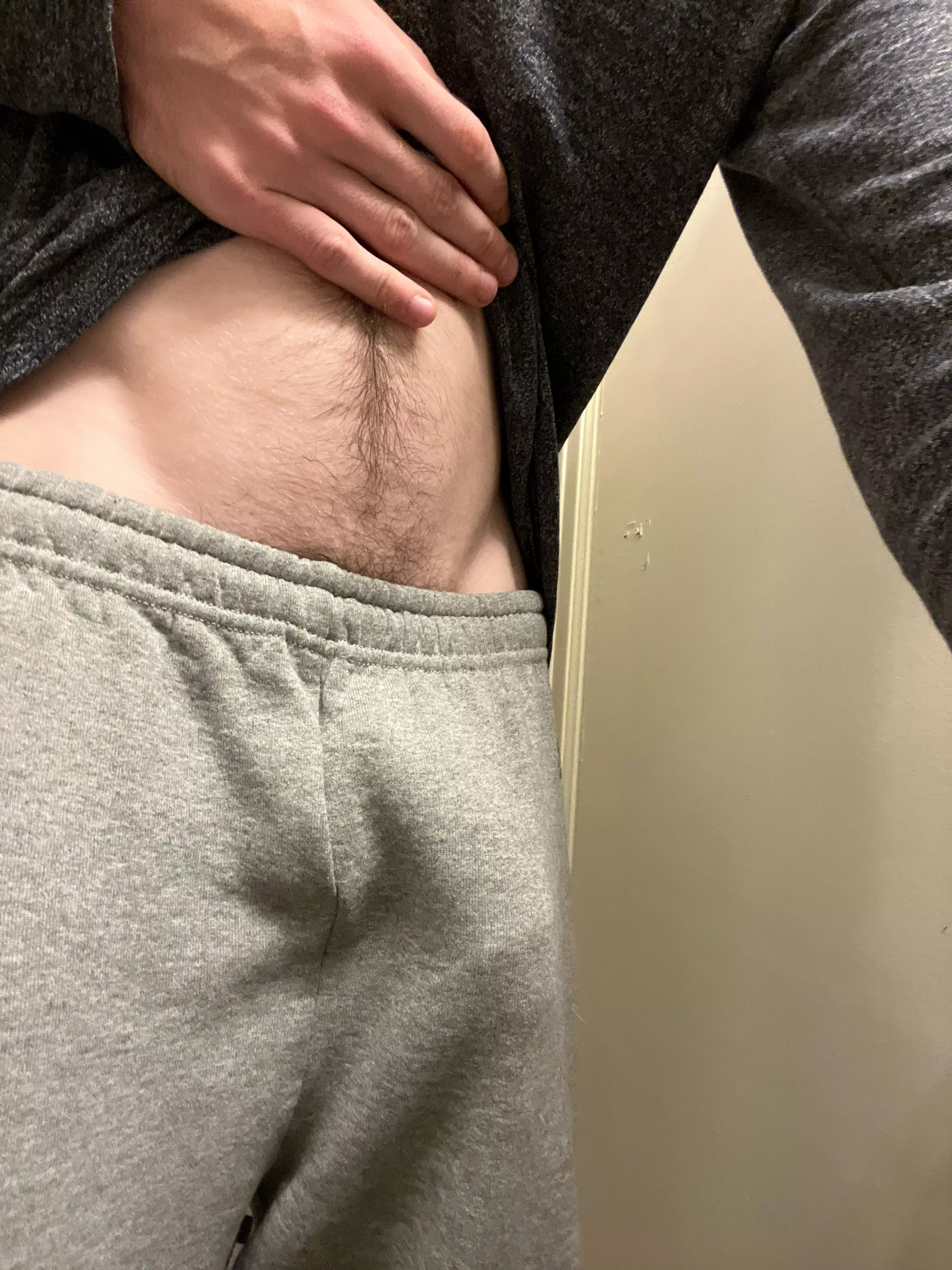 My big cock presses thru my sweatpants