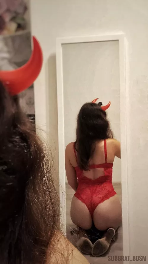 Red bodysuit with high heels