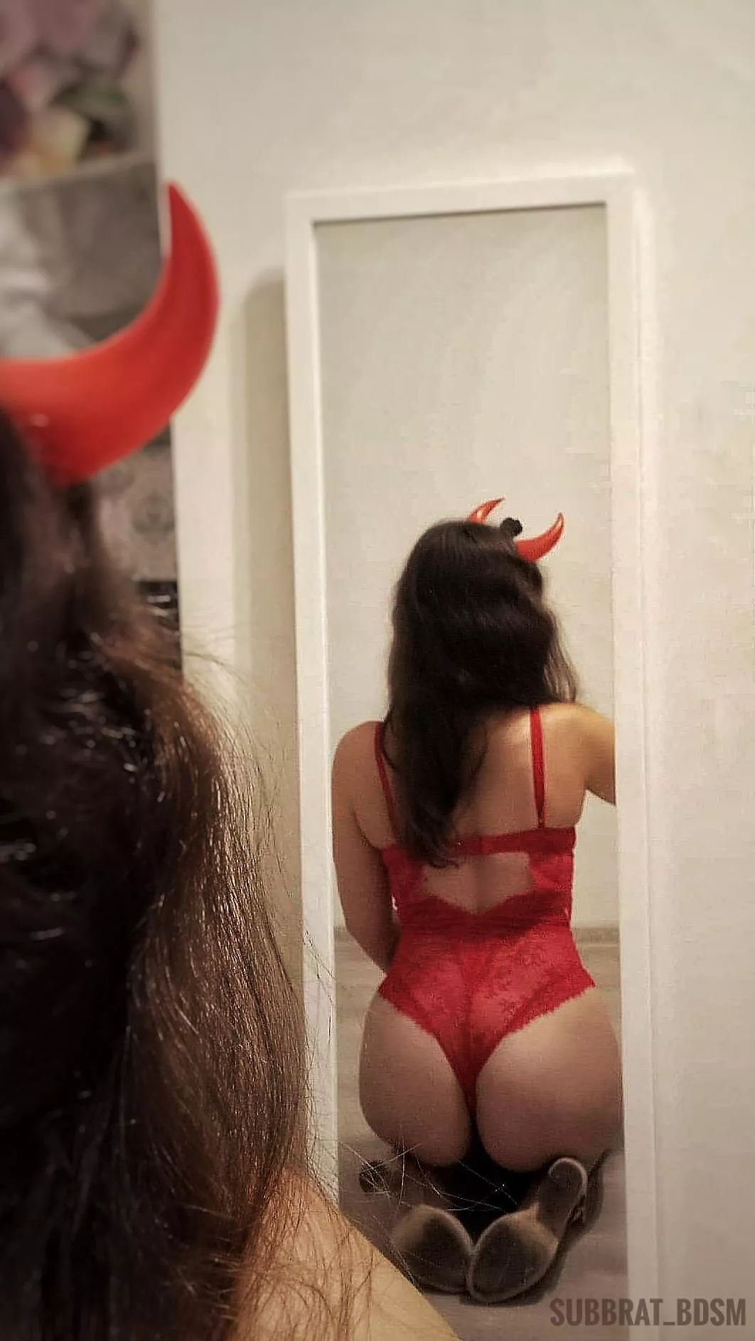 Red bodysuit with high heels