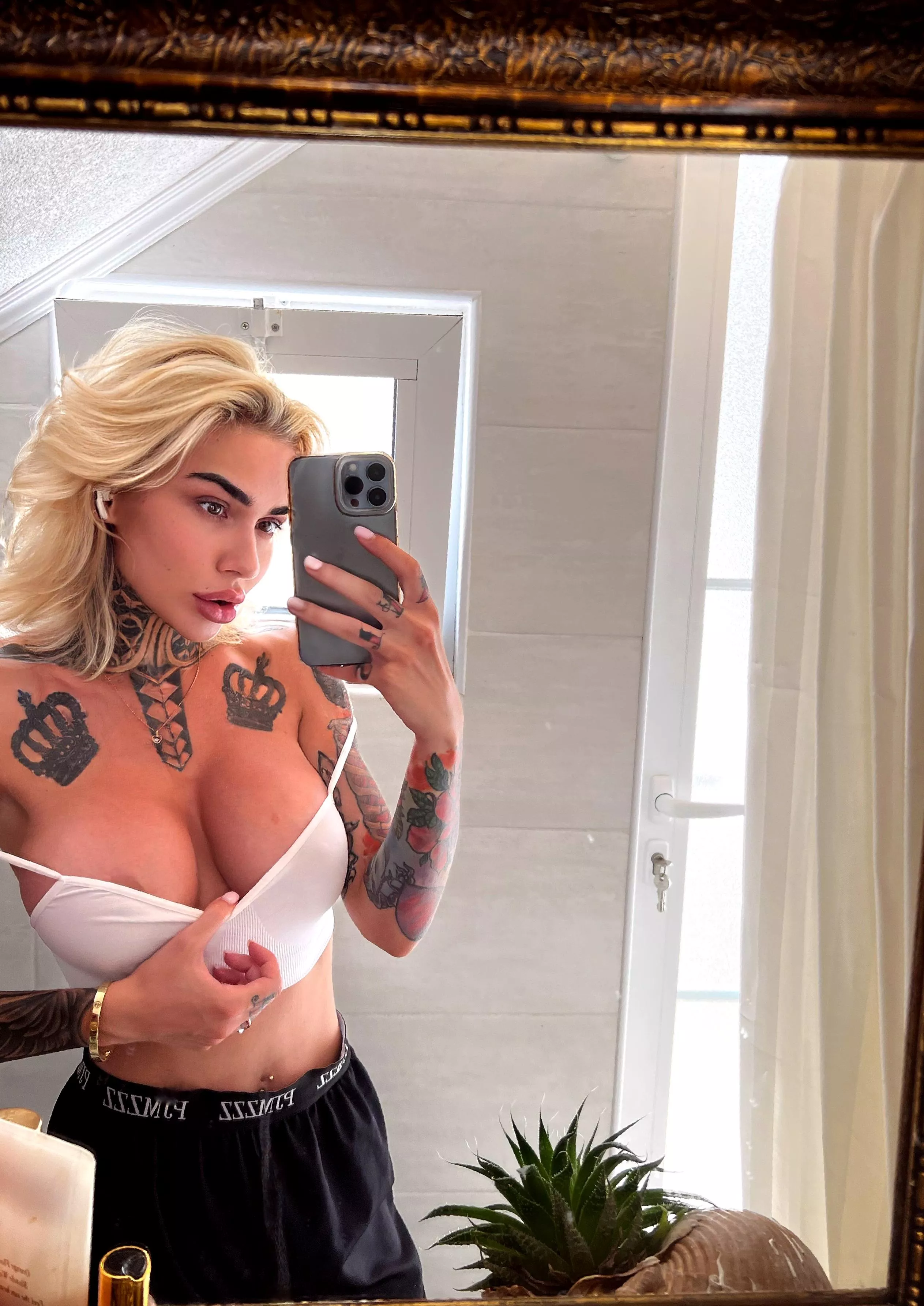 Casually showing off amazing breasts