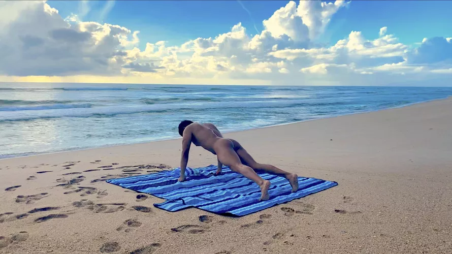 Naked yoga at the beach