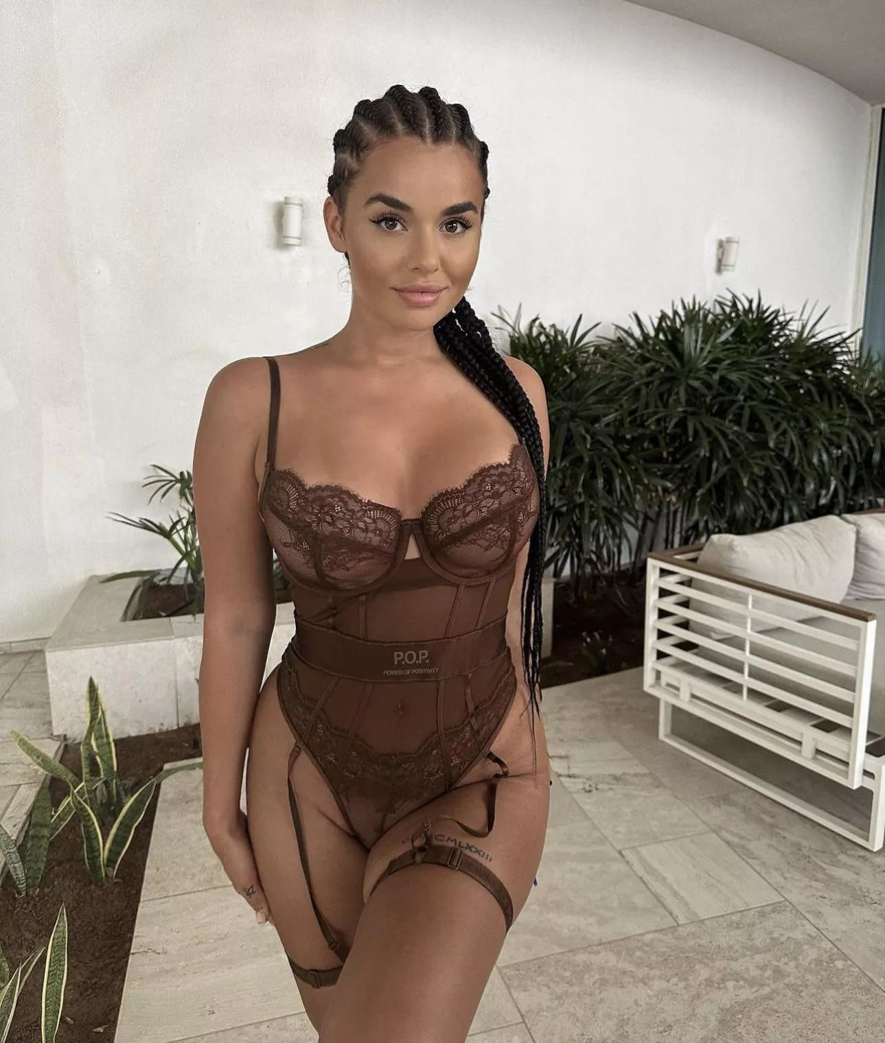 Beauty in brown lingerie body suit