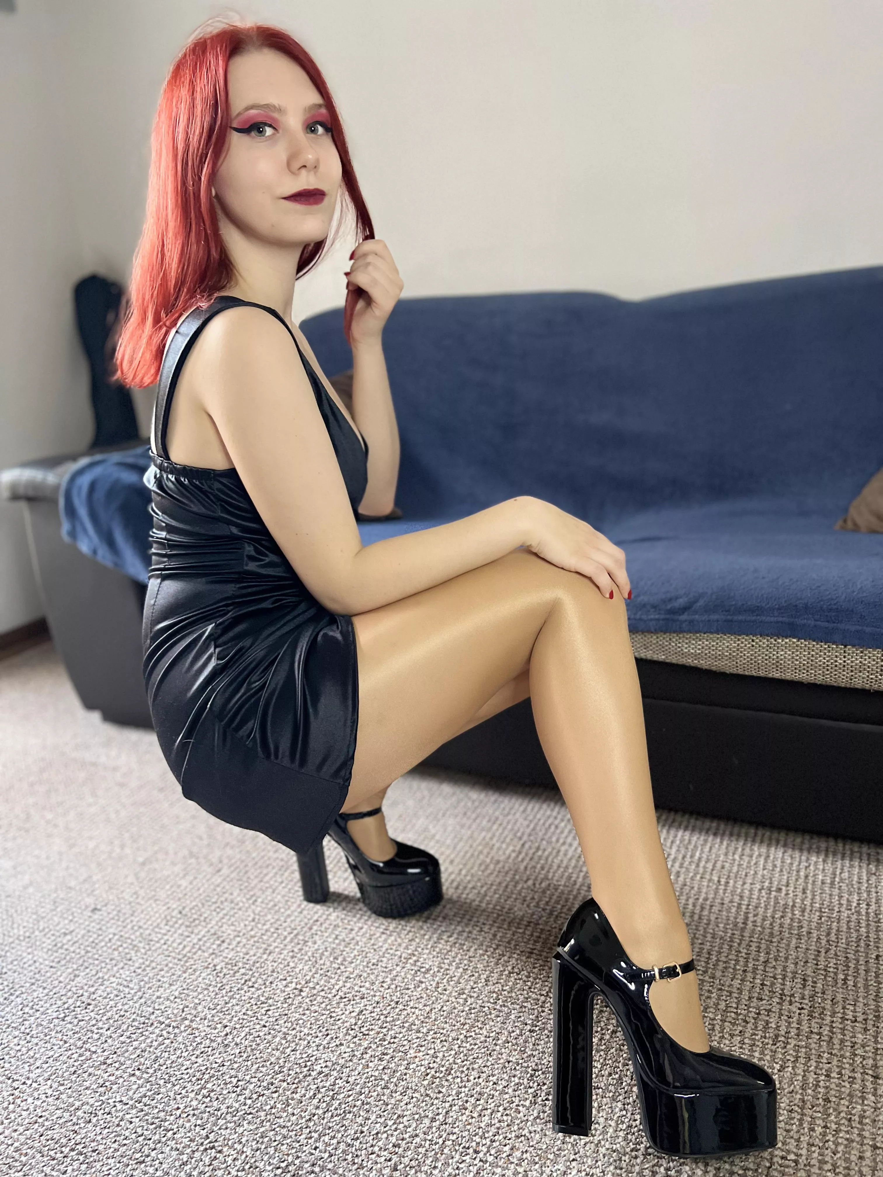 Legs in shiny wolford pantyhose