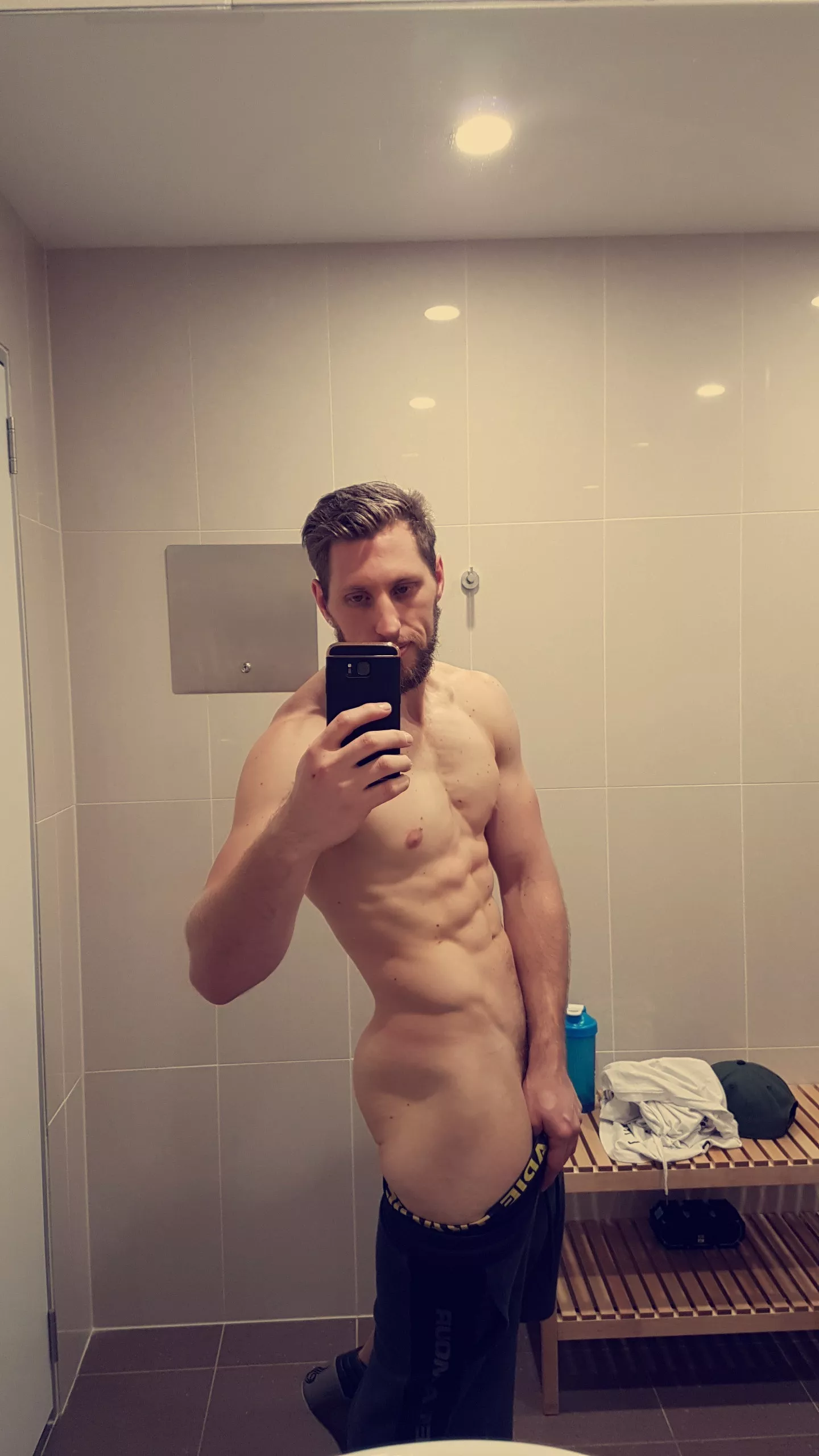 Quick physique check in the gym bathroom