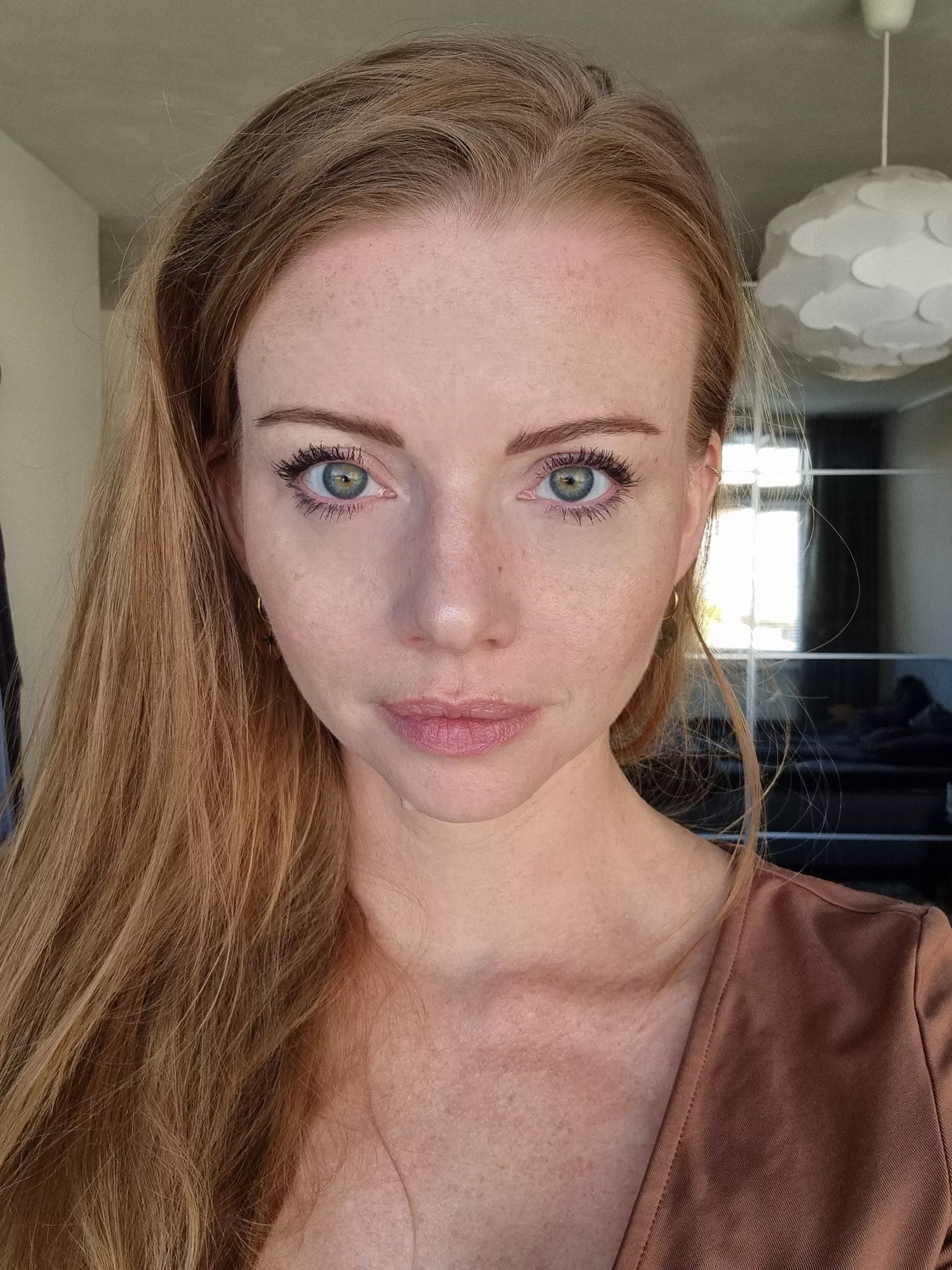 Freckles, orange eyes, good light