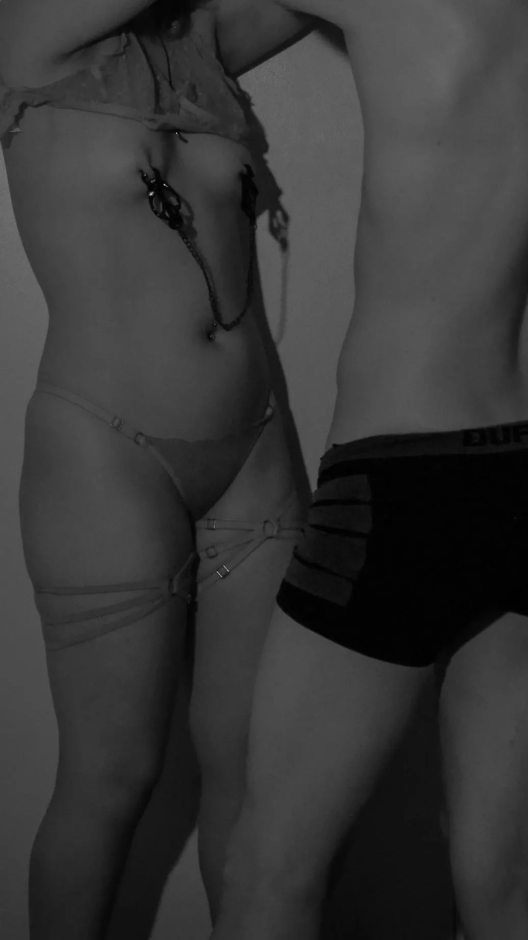 Clamps over pierced nipples