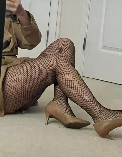 Trench coat and fishnet tights, anyone?