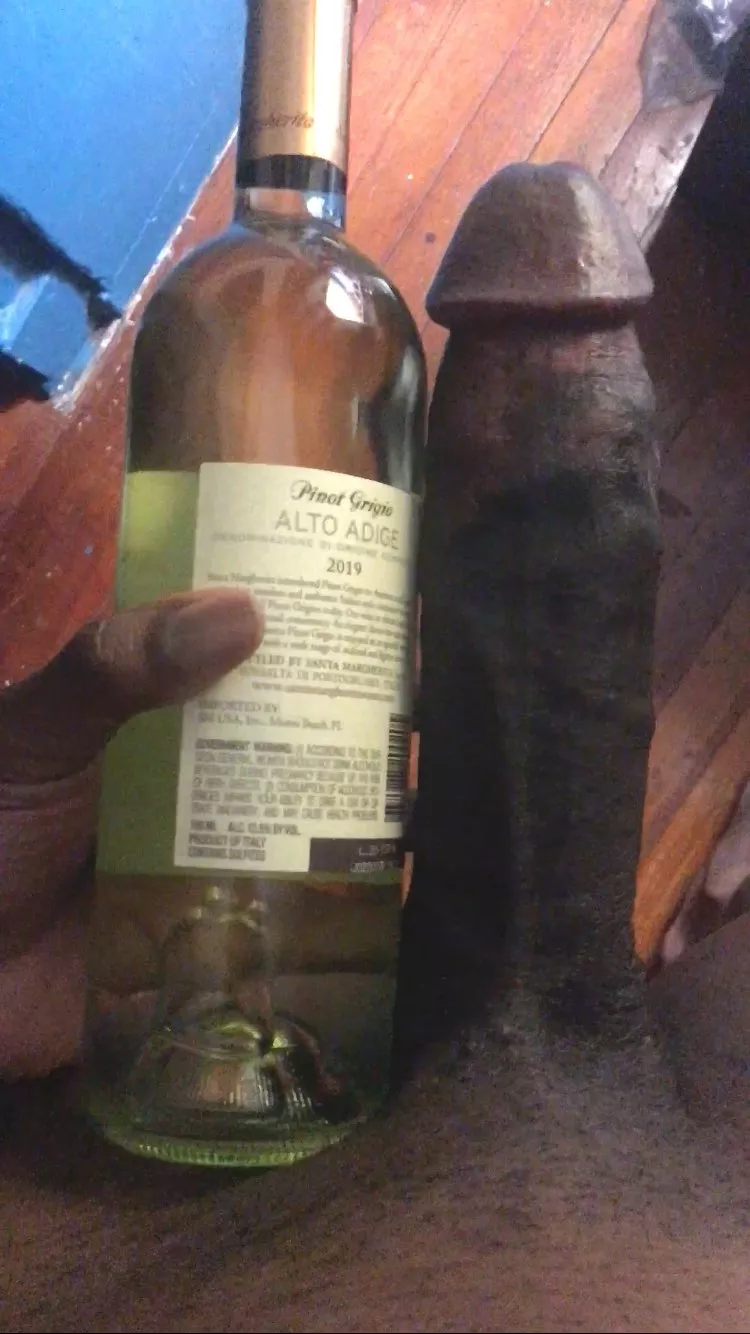 My dick next to a bottle of rum