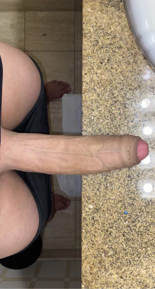 my thick heavy cock resting on the hotel counter