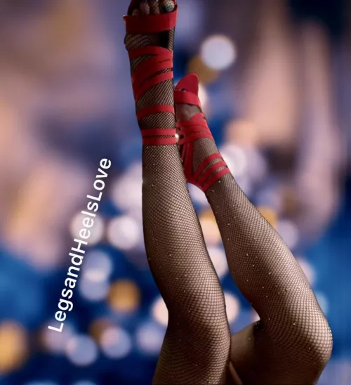 Red heels and sparkly fishnet tights.