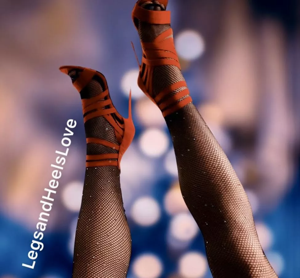 Red strappy heels and sparkle fishnets