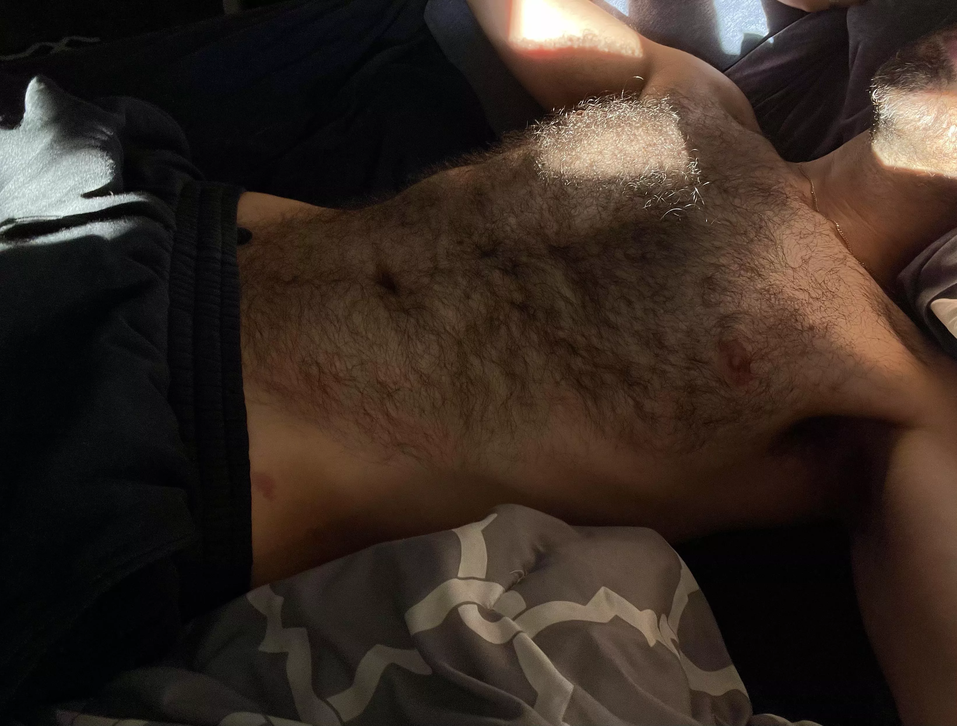 Who wants to join this hairy daddy in bed?