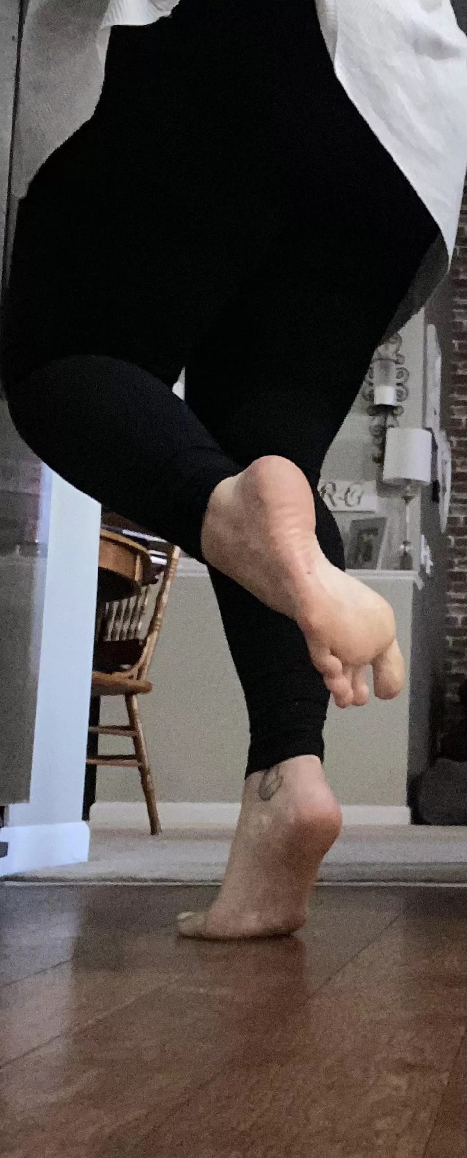 Barefoot and busy in the kitchen