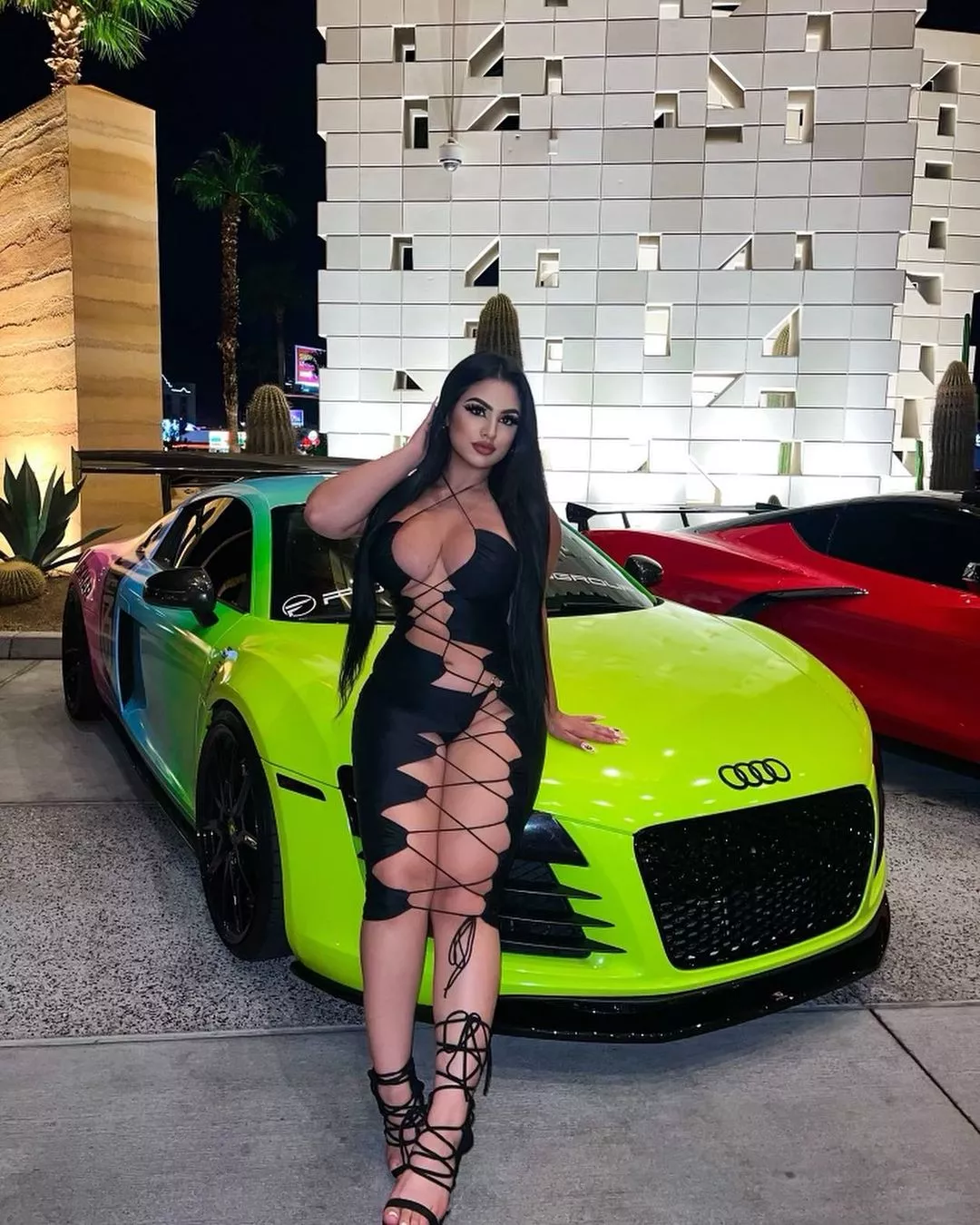 Nice car and revealing dress