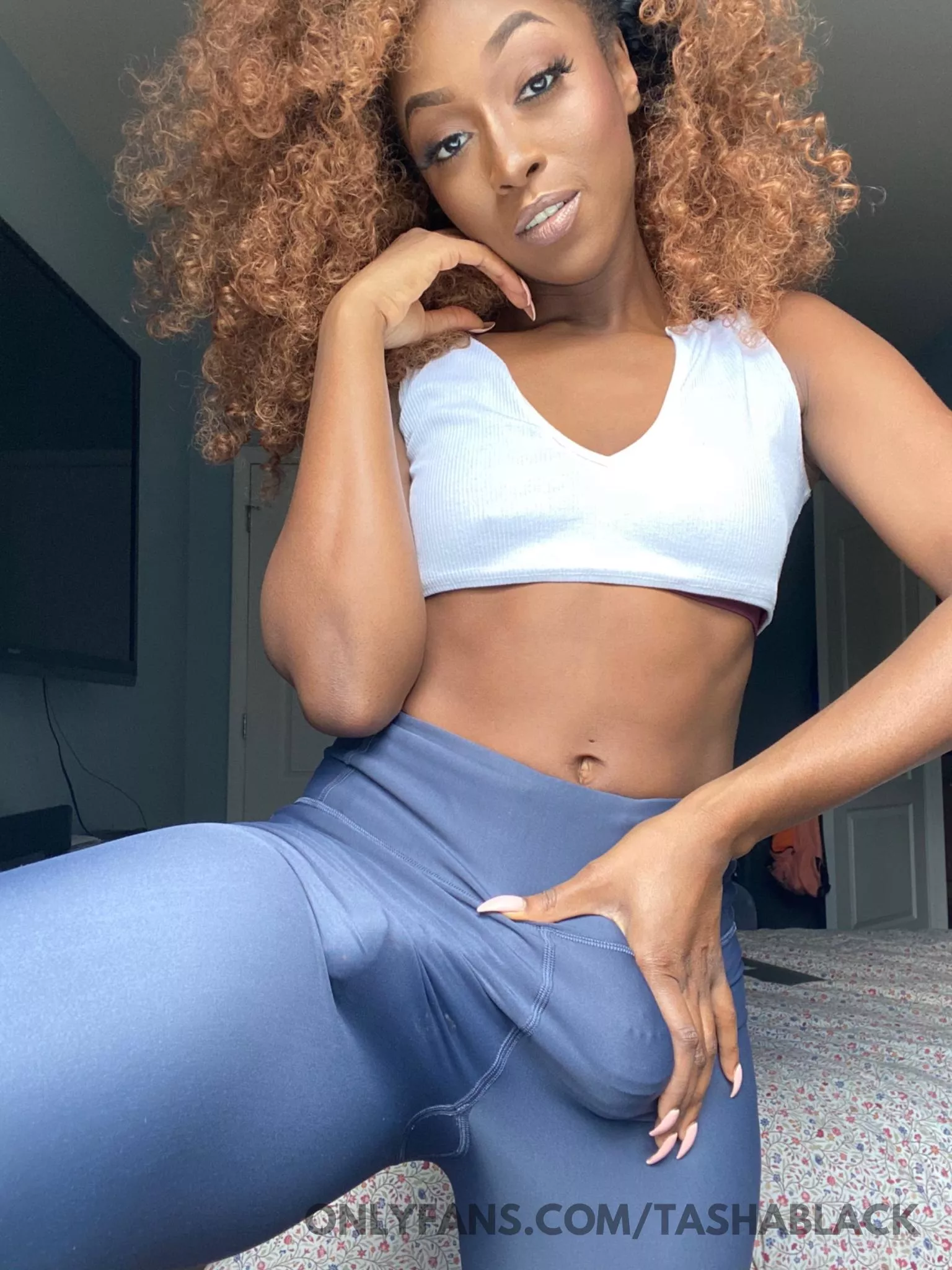 Stunning woman not-so-hiding a giant cock. I know you love it.