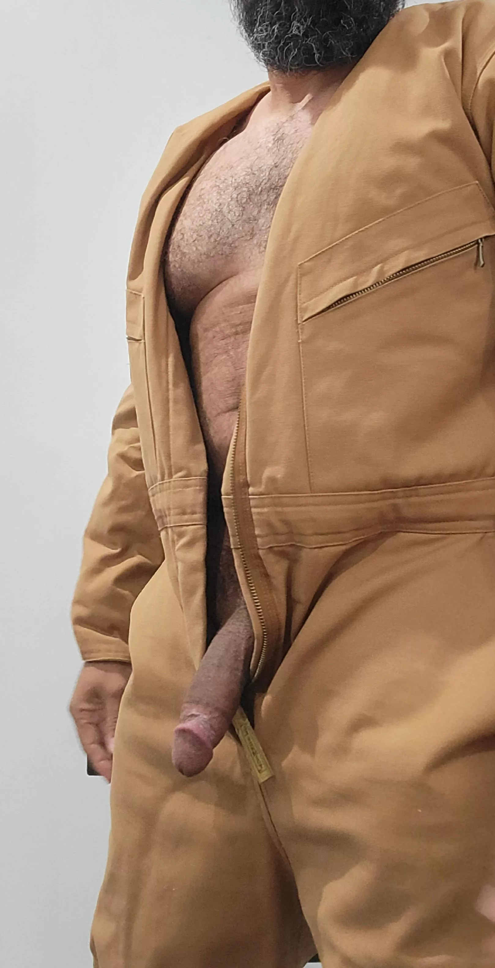 What's under those work coveralls.