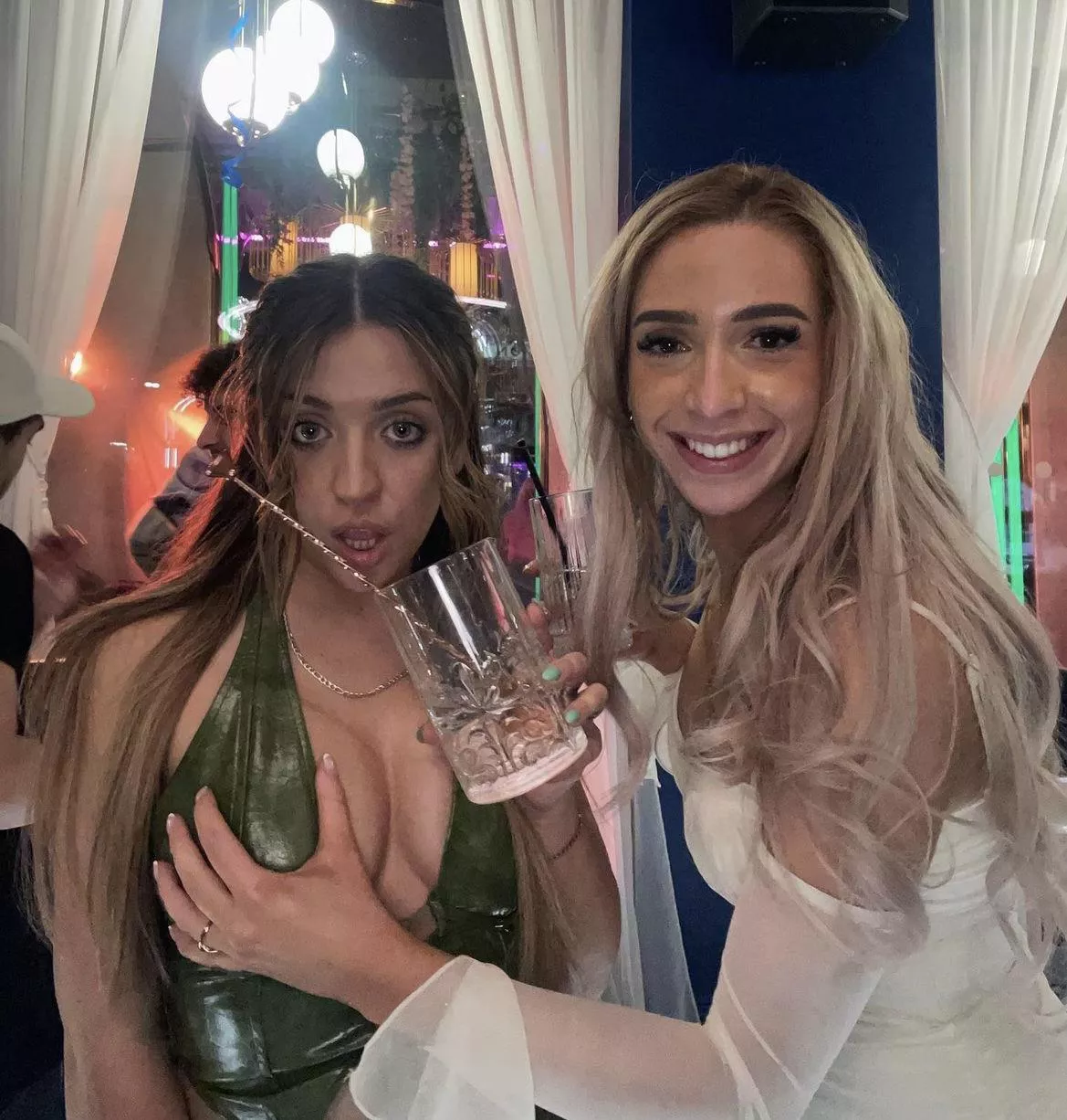 Groping her friends tits