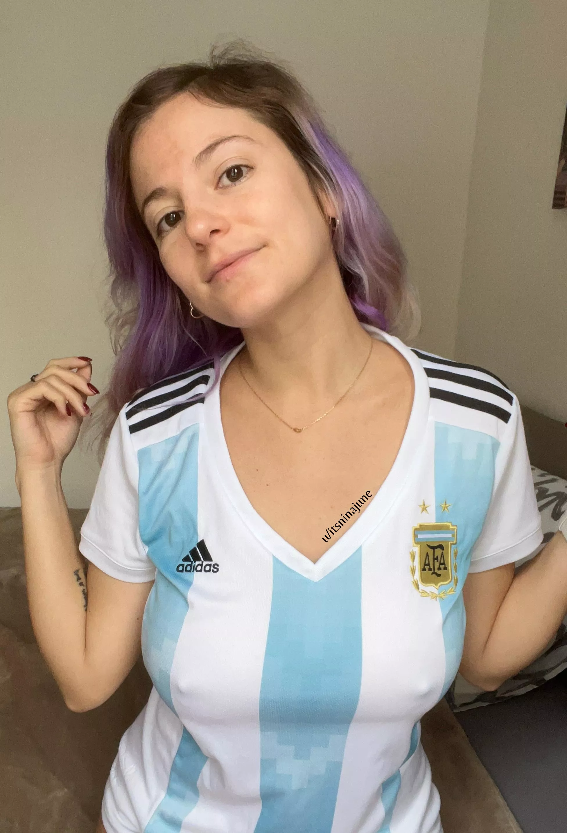 How to properly support your team, wearing their jersey braless.