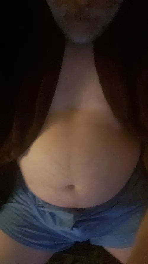 just a bear in boxers ready to hibernate with an unknown cub