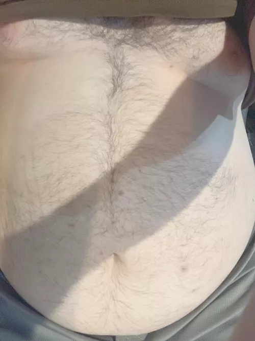 Just sitting here with my belly out